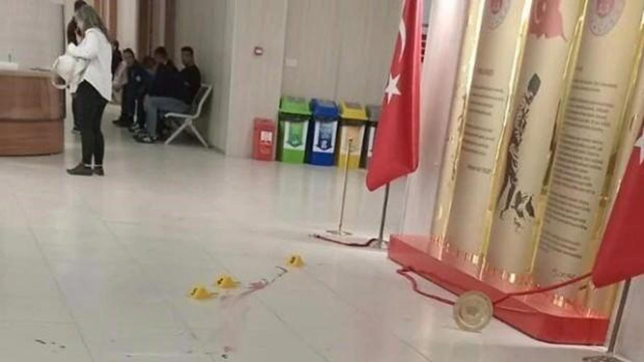 Boşanmak istemeyen karısını adliyede bıçakladı